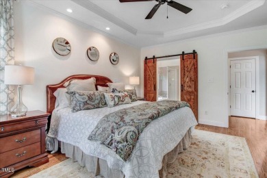 Welcome to your dream retreat! Nestled along the Signature 14th on The Neuse Golf Club in North Carolina - for sale on GolfHomes.com, golf home, golf lot