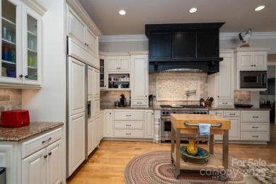 Welcome to this truly spectacular lakefront dream home in the on Old North State Club at Uwharrie Point Golf community in North Carolina - for sale on GolfHomes.com, golf home, golf lot
