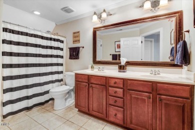 Welcome to your dream retreat! Nestled along the Signature 14th on The Neuse Golf Club in North Carolina - for sale on GolfHomes.com, golf home, golf lot