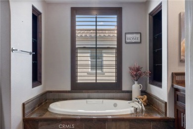 Step into the epitome of exclusive, gated Dos Lagos living with on Glen Ivy Golf Club in California - for sale on GolfHomes.com, golf home, golf lot