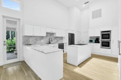 Private Contemporary Estate with Golf & Water Views!! Nearly 1 on Bocaire Country Club in Florida - for sale on GolfHomes.com, golf home, golf lot