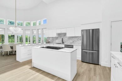 Private Contemporary Estate with Golf & Water Views!! Nearly 1 on Bocaire Country Club in Florida - for sale on GolfHomes.com, golf home, golf lot