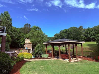 Welcome to your dream retreat! Nestled along the Signature 14th on The Neuse Golf Club in North Carolina - for sale on GolfHomes.com, golf home, golf lot