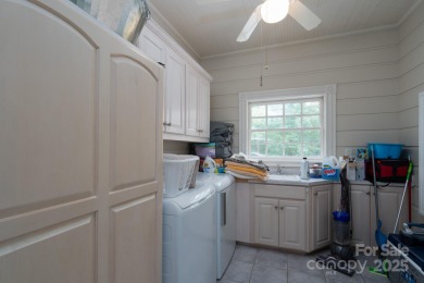 Welcome to this truly spectacular lakefront dream home in the on Old North State Club at Uwharrie Point Golf community in North Carolina - for sale on GolfHomes.com, golf home, golf lot
