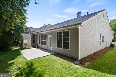 Welcome to this charming, recently upgraded 3-bedroom on Eagles Landing Country Club in Georgia - for sale on GolfHomes.com, golf home, golf lot