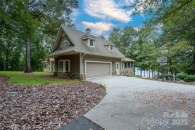 Welcome to this truly spectacular lakefront dream home in the on Old North State Club at Uwharrie Point Golf community in North Carolina - for sale on GolfHomes.com, golf home, golf lot