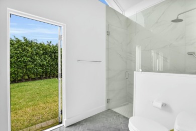 Private Contemporary Estate with Golf & Water Views!! Nearly 1 on Bocaire Country Club in Florida - for sale on GolfHomes.com, golf home, golf lot