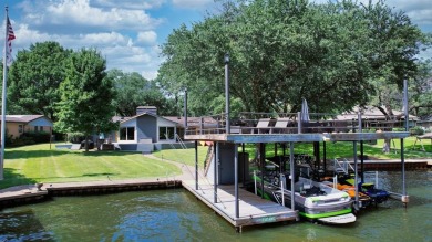 This beautifully remodeled lakehouse, completed in 2021, is a on Cedar Creek Country Club in Texas - for sale on GolfHomes.com, golf home, golf lot