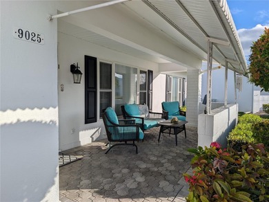 Under contract-accepting backup offers. Pride of ownership is on Mainlands Golf Club in Florida - for sale on GolfHomes.com, golf home, golf lot