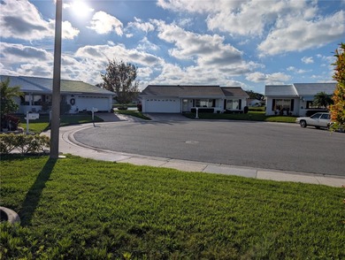 Under contract-accepting backup offers. Pride of ownership is on Mainlands Golf Club in Florida - for sale on GolfHomes.com, golf home, golf lot