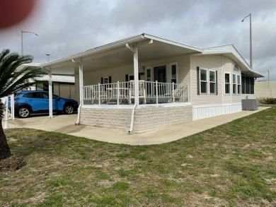 This very roomy 2 bedroom/2 bath home is on two lots and is on Deer Creek RV Golf Resort in Florida - for sale on GolfHomes.com, golf home, golf lot