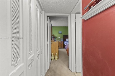 Ground-floor 2/2 in Pine Island Ridge Country Club with gorgeous on Pine Island Ridge Country Club in Florida - for sale on GolfHomes.com, golf home, golf lot