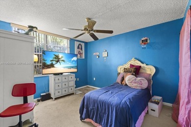 Ground-floor 2/2 in Pine Island Ridge Country Club with gorgeous on Pine Island Ridge Country Club in Florida - for sale on GolfHomes.com, golf home, golf lot