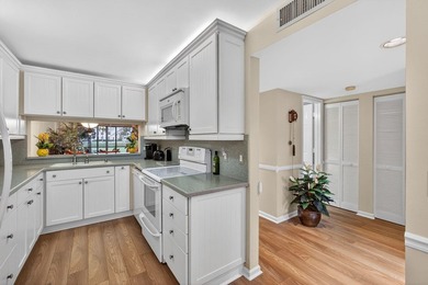 Rare first floor - corner unit in the centrally located Keystone on The Golf Club of Jupiter in Florida - for sale on GolfHomes.com, golf home, golf lot