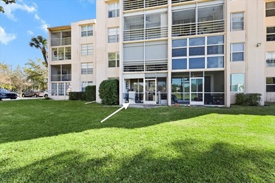 Ground-floor 2/2 in Pine Island Ridge Country Club with gorgeous on Pine Island Ridge Country Club in Florida - for sale on GolfHomes.com, golf home, golf lot
