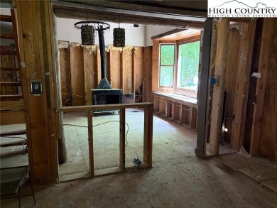 This property is being sold as-is and offers a unique on Land Harbor Golf Course in North Carolina - for sale on GolfHomes.com, golf home, golf lot