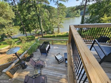 Check out this awesome lakefront property on Jackson Lake in the on Turtle Cove Golf Course in Georgia - for sale on GolfHomes.com, golf home, golf lot