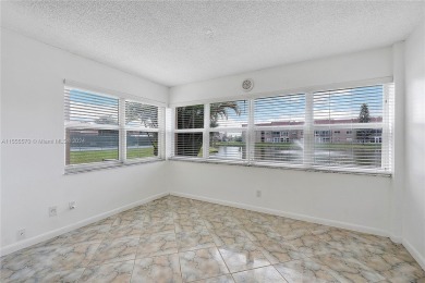 Spacious 1 bedroom, 1.5 bathroom unit on the ground floor in on Sunrise Lakes Phase III in Florida - for sale on GolfHomes.com, golf home, golf lot