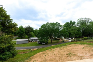 Updated water view home with a full basement, located less than on Piney Point Golf Club in North Carolina - for sale on GolfHomes.com, golf home, golf lot
