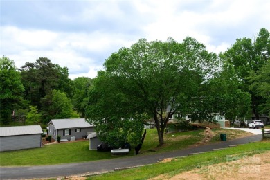 Updated water view home with a full basement, located less than on Piney Point Golf Club in North Carolina - for sale on GolfHomes.com, golf home, golf lot