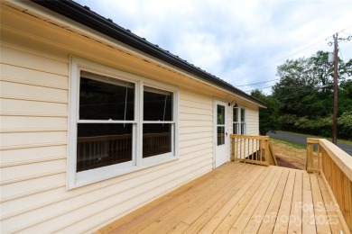 Updated water view home with a full basement, located less than on Piney Point Golf Club in North Carolina - for sale on GolfHomes.com, golf home, golf lot