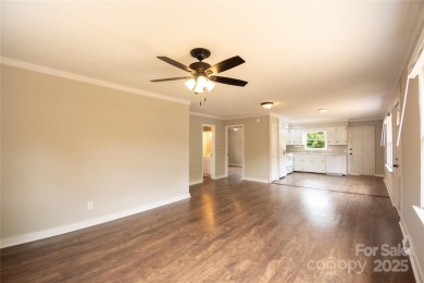Updated water view home with a full basement, located less than on Piney Point Golf Club in North Carolina - for sale on GolfHomes.com, golf home, golf lot