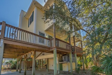Complete with picturesque live oak in the back yard, this on The Plantation Course At Edisto in South Carolina - for sale on GolfHomes.com, golf home, golf lot