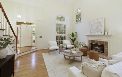 Nestled in the charming Spinnakers of Windward, an intimate on The Golf Club of Georgia in Georgia - for sale on GolfHomes.com, golf home, golf lot