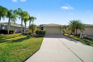 Enjoy peaceful pond views and the scenic 12th green from this on Tampa Bay Golf and Country Club in Florida - for sale on GolfHomes.com, golf home, golf lot