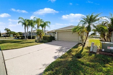 Enjoy peaceful pond views and the scenic 12th green from this on Tampa Bay Golf and Country Club in Florida - for sale on GolfHomes.com, golf home, golf lot
