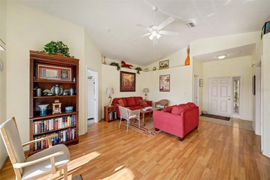 Enjoy peaceful pond views and the scenic 12th green from this on Tampa Bay Golf and Country Club in Florida - for sale on GolfHomes.com, golf home, golf lot