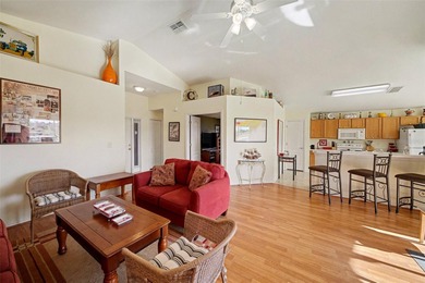 Enjoy peaceful pond views and the scenic 12th green from this on Tampa Bay Golf and Country Club in Florida - for sale on GolfHomes.com, golf home, golf lot