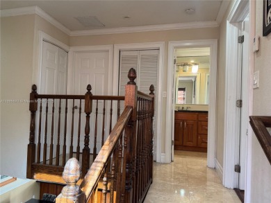 Nestled in a prestigious golf community, this beautifully on  in Florida - for sale on GolfHomes.com, golf home, golf lot