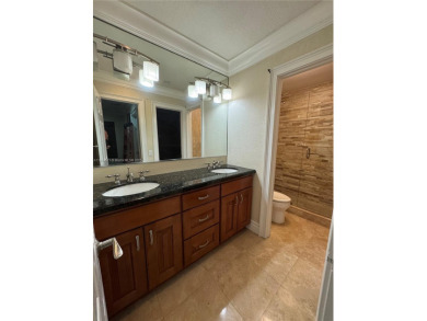 Nestled in a prestigious golf community, this beautifully on  in Florida - for sale on GolfHomes.com, golf home, golf lot