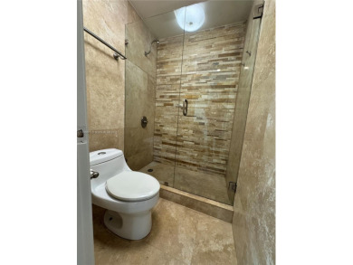 Nestled in a prestigious golf community, this beautifully on  in Florida - for sale on GolfHomes.com, golf home, golf lot