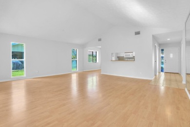 Welcome to your tropical retreat in the heart of Hobe Sound! on Eagle Wood Golf Course in Florida - for sale on GolfHomes.com, golf home, golf lot