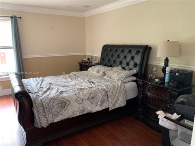 Nestled in a prestigious golf community, this beautifully on  in Florida - for sale on GolfHomes.com, golf home, golf lot