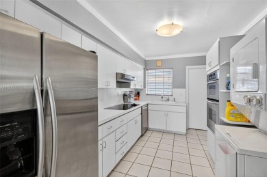 PRICE IMPROVEMENT! Lowest Priced Single Family Home in South on Miami Beach Golf Club in Florida - for sale on GolfHomes.com, golf home, golf lot
