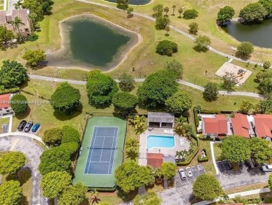 Nestled in a prestigious golf community, this beautifully on  in Florida - for sale on GolfHomes.com, golf home, golf lot
