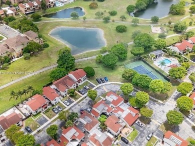 Nestled in a prestigious golf community, this beautifully on  in Florida - for sale on GolfHomes.com, golf home, golf lot