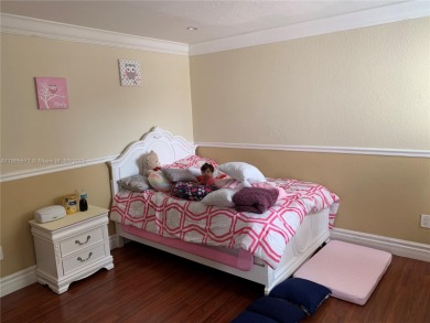 Nestled in a prestigious golf community, this beautifully on  in Florida - for sale on GolfHomes.com, golf home, golf lot