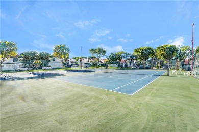 Nestled in a prestigious golf community, this beautifully on  in Florida - for sale on GolfHomes.com, golf home, golf lot