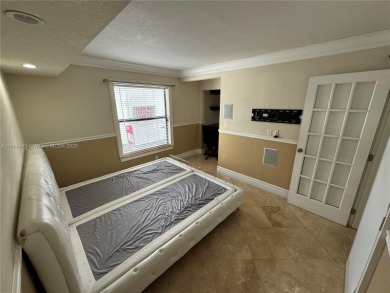 Nestled in a prestigious golf community, this beautifully on  in Florida - for sale on GolfHomes.com, golf home, golf lot
