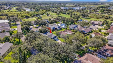Welcome to your tropical retreat in the heart of Hobe Sound! on Eagle Wood Golf Course in Florida - for sale on GolfHomes.com, golf home, golf lot