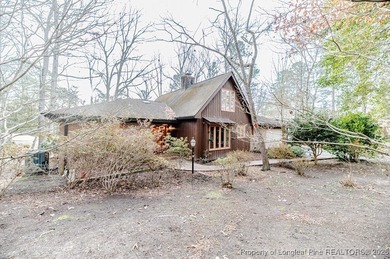 Experience comfortable, low-maintenance living in the gated golf on Carolina Trace Country Club in North Carolina - for sale on GolfHomes.com, golf home, golf lot