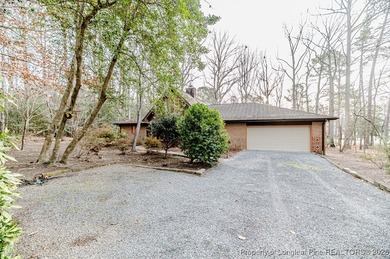 Experience comfortable, low-maintenance living in the gated golf on Carolina Trace Country Club in North Carolina - for sale on GolfHomes.com, golf home, golf lot