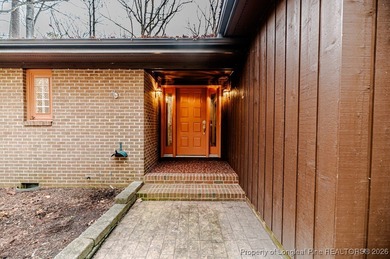 Experience comfortable, low-maintenance living in the gated golf on Carolina Trace Country Club in North Carolina - for sale on GolfHomes.com, golf home, golf lot