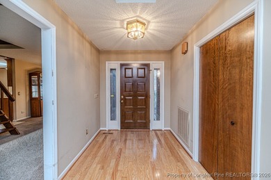 Experience comfortable, low-maintenance living in the gated golf on Carolina Trace Country Club in North Carolina - for sale on GolfHomes.com, golf home, golf lot