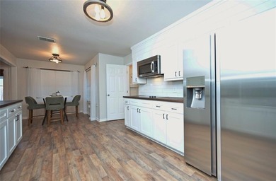 Location! Location! Beautiful custom built 2,164 sq. ft on De Cordova Bend Country Club in Texas - for sale on GolfHomes.com, golf home, golf lot