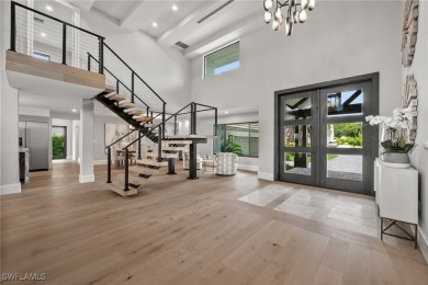 Refined luxury awaits at this fully remodeled estate in the on Fiddlesticks Country Club in Florida - for sale on GolfHomes.com, golf home, golf lot